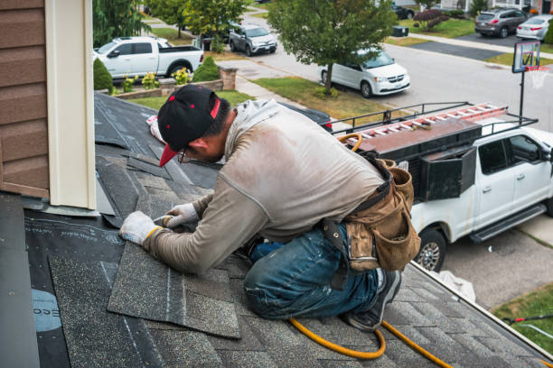 Professional Storm Damage Roof Repair technician working in Manchester Township, NJ